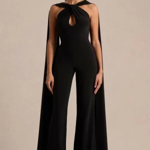 Mindy | Svart byxdress med halterneck och capeärm