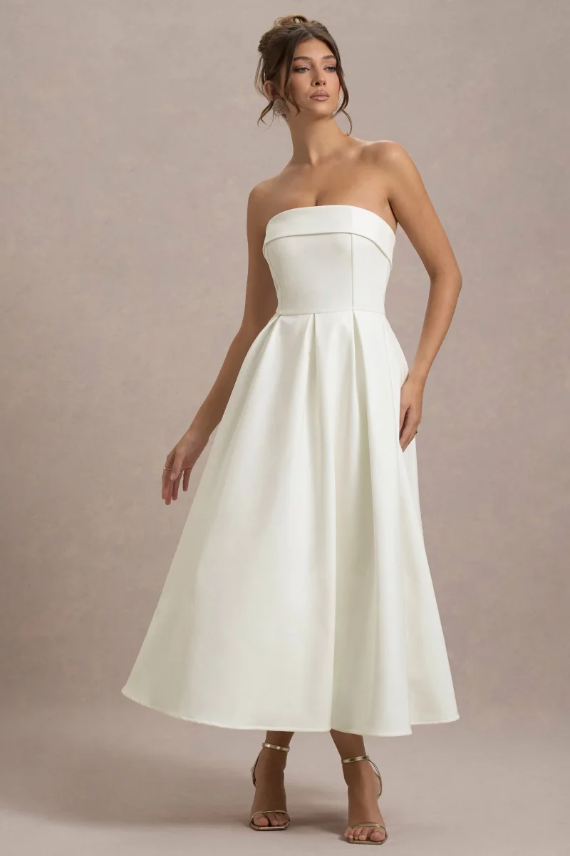 Annalise | Ecrufärgad axelbandslös midiklänning med klockad kjol - Bild 6